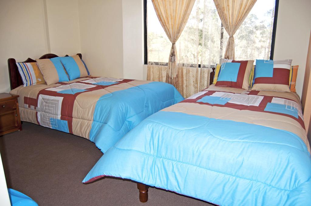 Hotel Residencial El Viajero Tababela Bilik gambar